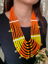 Load image into Gallery viewer, Goulu Timeless Necklace Orange Multi Strand With Brass Bell

